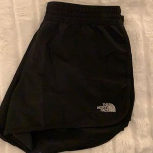 Black North Face running shorts. Size Small